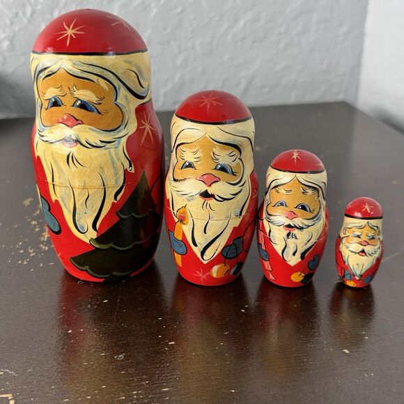 Vintage Hand Painted Nesting Santa Set Of 4 Russian Santa Claus Dolls - Picture 1 of 11